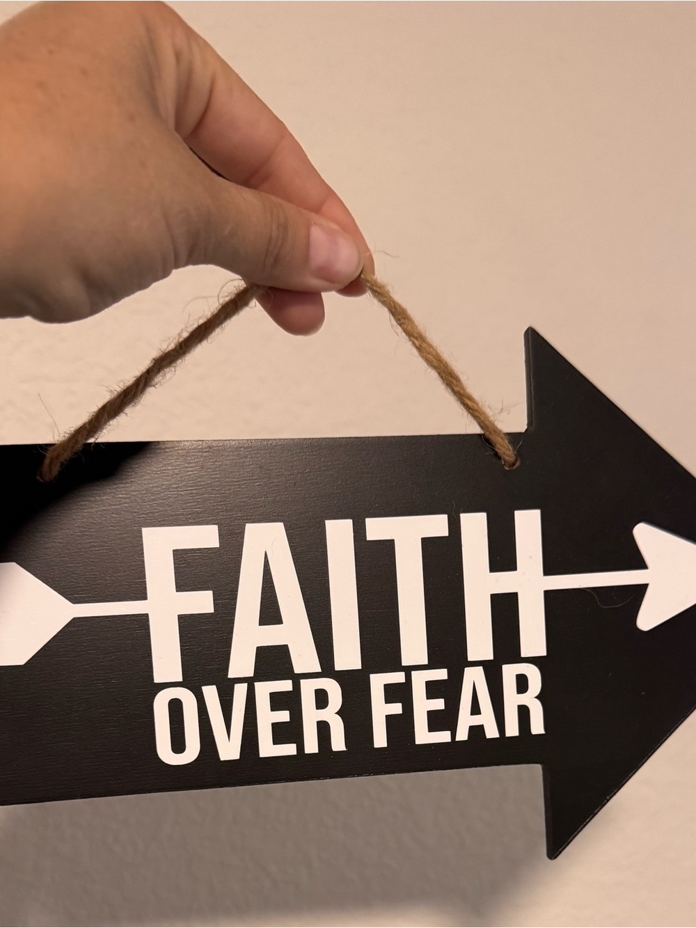 Black "Faith Over Fear" Arrow Wall Sign